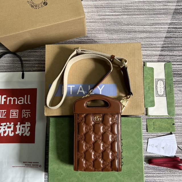 GG original matelasse leather top handle mini bag 723776 brown
