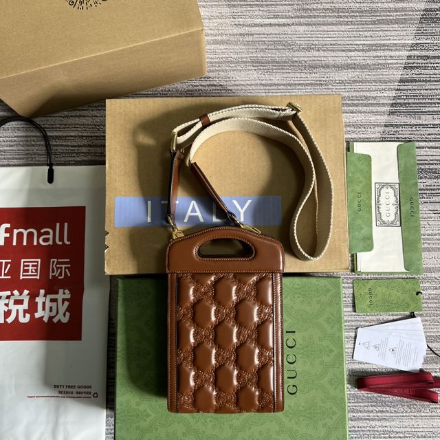 GG original matelasse leather top handle mini bag 723776 brown